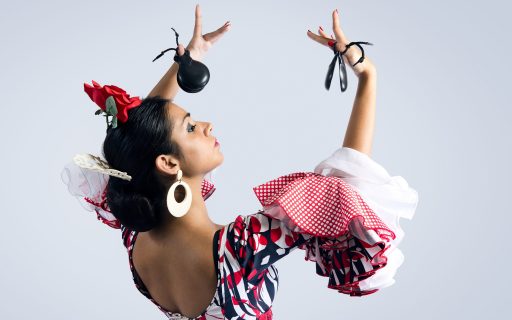 Portrait of young Flamenco dancer in beautiful dress